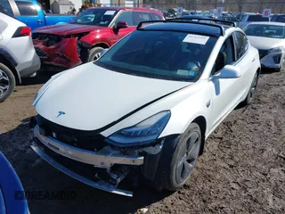 2020 Tesla Model 3 Long Range with VIN 5YJ3E1EB9LF735340, listed as a IAAI auction lot 41765919 with Not Provided miles. Bid and sale history available at carsss.com. Image 21.