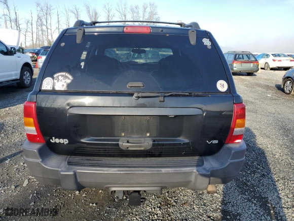 1999 Jeep Grand Cherokee Laredo with VIN 1J4GW58N1XC737706, listed as a Copart auction lot 83107914 with 0 mi miles and Salvage Title. Bid and sale history available at carsss.com. Image 6.