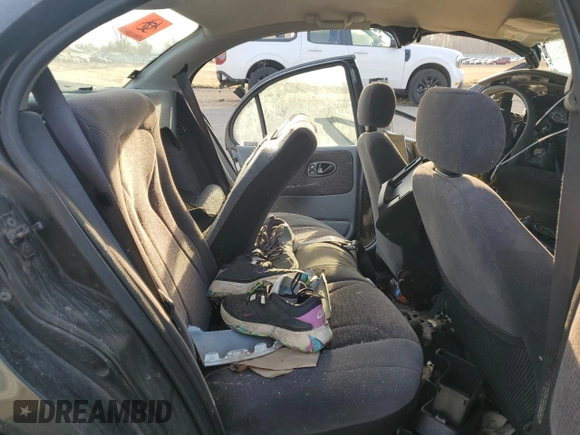 2000 Saturn SL with VIN 1G8ZK527XYZ259766, listed as a Copart auction lot 48911825 with Not provided miles and Salvage title. Bid and sale history available at DreamBid. Image 10.