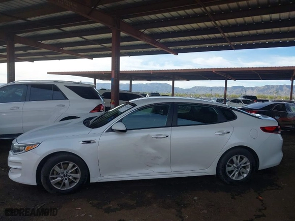 2016 Kia Optima LX with VIN 5XXGT4L31GG049316, listed as a IAAI auction lot 41786981 with 148,345 mi miles. Bid and sale history available at carsss.com. Image 14.