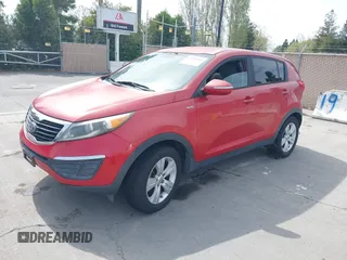 2013 Kia Sportage LX with VIN KNDPBCA26D7355889, listed as a IAAI auction lot 42054415 with 136,859 mi miles and . Bid and sale history available at carsss.com. Image 2.