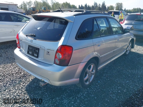 2002 Mazda Protege z VIN JM1BJ246221493337, wystawiony jako IAAI lot #42171966 z przebiegiem 244 609 mil mil oraz . Historia ofert i sprzedaży dostępna na DreamBid. Obrazek 4.