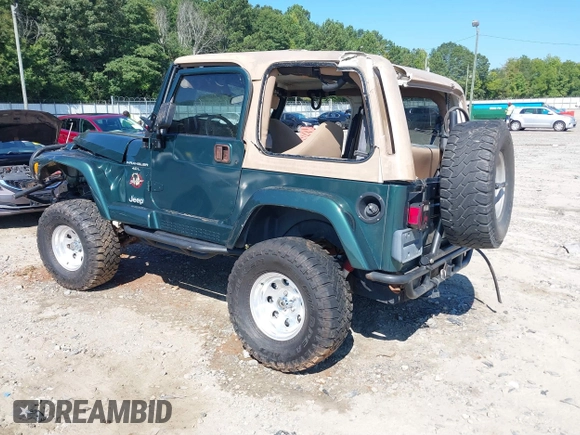 2001 Jeep Wrangler Sahara with VIN 1J4FA59S71P340368, listed as a IAAI auction lot 40148603 with 138,710 mi miles. Bid and sale history available at carsss.com. Image 3.