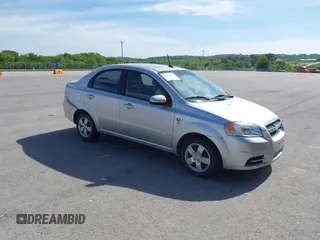 2011 Chevrolet Aveo 1LT z VIN KL1TD5DE9BB151521, wystawiony jako IAAI lot #42232118 z przebiegiem 159 031 mil mil oraz . Historia ofert i sprzedaży dostępna na DreamBid. Obrazek 1.