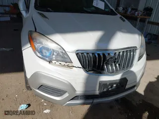 2015 Buick Encore with VIN KL4CJASB0FB211656, listed as a IAAI auction lot 41631355 with 135,232 mi miles. Bid and sale history available at carsss.com. Image 6.