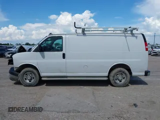 2021 Chevrolet Express Cargo with VIN 1GCWGAFP5M1258210, listed as a IAAI auction lot 42378121 with 50,438 mi miles and . Bid and sale history available at DreamBid. Image 14.