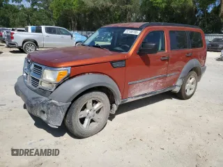 2007 Dodge Nitro SXT z VIN 1D8GT28K47W690156, wystawiony jako Copart lot #52108785 z przebiegiem 229 880 mil mil oraz Szkody całkowita. Historia ofert i sprzedaży dostępna na DreamBid. Obrazek 1.