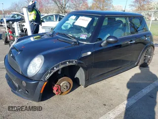 2006 MINI Hardtop S with VIN WMWRE33526TL24203, listed as a IAAI auction lot 41988451 with 88,746 mi miles and . Bid and sale history available at DreamBid. Image 2.