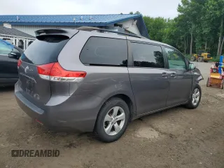 2014 Toyota Sienna LE AAS with VIN 5TDKK3DC9ES521442, listed as a Copart auction lot 64471525 with 331,395 mi miles and Salvage title. Bid and sale history available at DreamBid. Image 3.