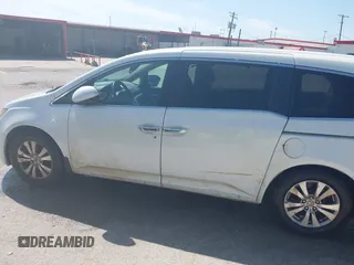 2014 Honda Odyssey EX-L z VIN 5FNRL5H61EB001509, wystawiony jako IAAI lot #42371539 z przebiegiem 259 195 mil mil oraz . Historia ofert i sprzedaży dostępna na DreamBid. Obrazek 14.