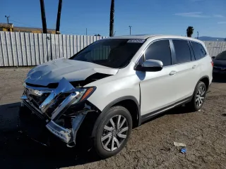 2020 Honda Pilot EX-L with VIN 5FNYF5H5XLB023273, listed as a Copart auction lot 46121255 with 22,897 mi miles and Salvage Title. Bid and sale history available at carsss.com. Image 1.