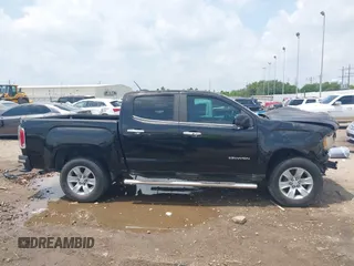 2015 GMC Canyon 2WD SLE with VIN 1GTG5BE3XF1226497, listed as a IAAI auction lot 42106960 with 97,360 mi miles and . Bid and sale history available at carsss.com. Image 14.