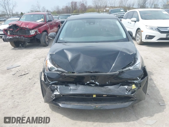 2017 Toyota Prius Two with VIN JTDKARFUXH3041931, listed as a IAAI auction lot 42075004 with 75,768 mi miles and . Bid and sale history available at DreamBid. Image 12.