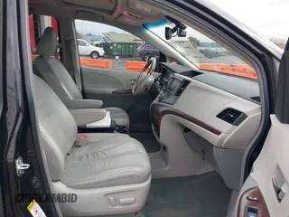 2011 Toyota Sienna XLE AAS with VIN 5TDYK3DC5BS141021, listed as a IAAI auction lot 41538641 with 127,805 mi miles and . Bid and sale history available at DreamBid. Image 5.