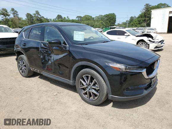 2018 Mazda CX-5 Grand Touring z VIN JM3KFADM2J1381752, wystawiony jako Copart lot #56889835 z przebiegiem 96 820 mil mil oraz Szkoda całkowita • Salvage title. Historia ofert i sprzedaży dostępna na DreamBid. Obrazek 4.