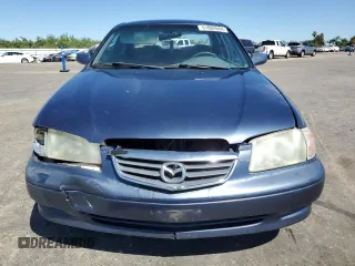 2002 Mazda 626 LX with VIN 1YVGF22C825293243, listed as a Copart auction lot 61084684 with 217,339 mi miles and Salvage Title. Bid and sale history available at carsss.com. Image 5.