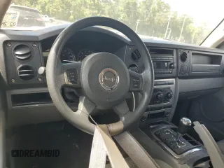 2006 Jeep Commander with VIN 1J8HH48KX6C203308, listed as a Copart auction lot 64456765 with 185,794 mi miles and Salvage title. Bid and sale history available at DreamBid. Image 8.