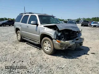 2002 Chevrolet Tahoe Z71 z VIN 1GNEK13T72R285197, wystawiony jako Copart lot #53784905 z przebiegiem 226 662 mil mil oraz Szkoda całkowita • Salvage title. Historia ofert i sprzedaży dostępna na DreamBid. Obrazek 15.
