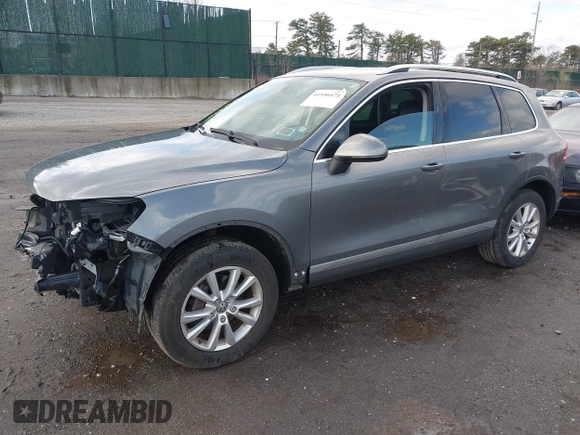2013 Volkswagen Touareg Lux with VIN WVGEF9BPXDD000679, listed as a IAAI auction lot 41956471 with 117,465 mi miles and . Bid and sale history available at DreamBid. Image 18.