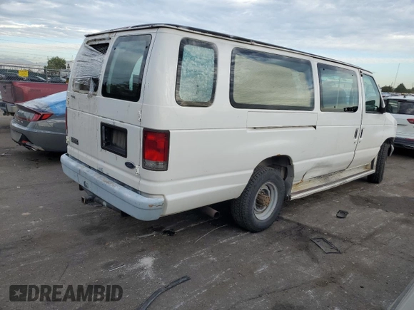 1999 Ford Econoline Passenger XL with VIN 1FBSS31L2XHA95612, listed as a Copart auction lot 72615104 with 211,283 mi miles and Salvage Title. Bid and sale history available at DreamBid. Image 3.