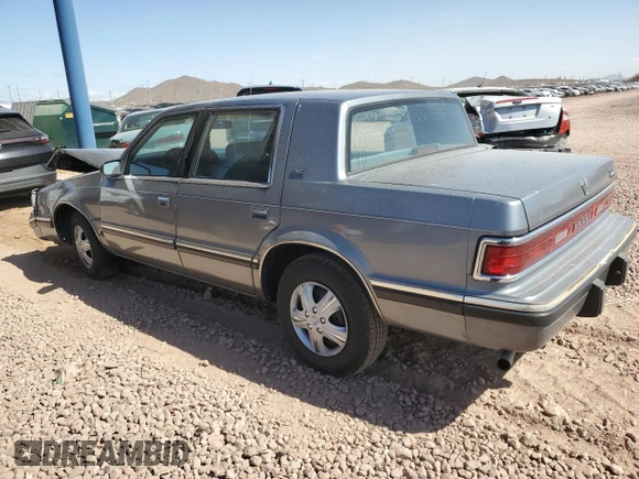 1991 Dodge Dynasty LE z VIN 1B3XC56R9MD115785, wystawiony jako Copart lot #48073715 z przebiegiem 64 483 mil mil oraz Szkoda całkowita • Salvage title. Historia ofert i sprzedaży dostępna na DreamBid. Obrazek 2.