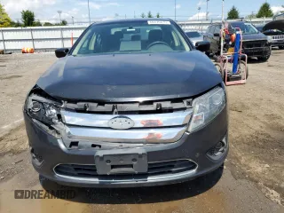2012 Ford Fusion SE z VIN 3FAHP0HA7CR306411, wystawiony jako Copart lot #60476635 z przebiegiem 173 779 mil mil oraz Szkoda całkowita • Salvage title. Historia ofert i sprzedaży dostępna na DreamBid. Obrazek 5.