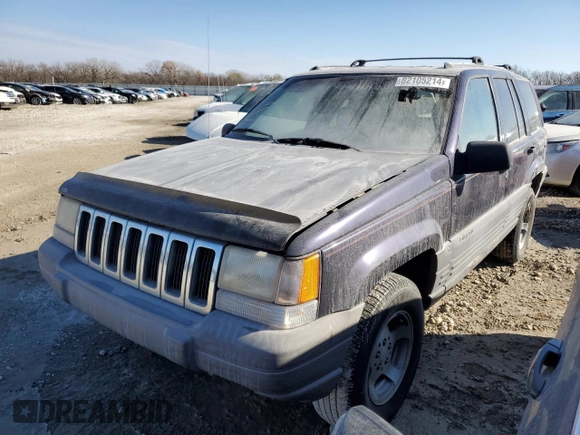 1997 Jeep Grand Cherokee Laredo with VIN 1J4GZ58S7VC685900, listed as a Copart auction lot 82105214 with 151,036 mi miles and Salvage Title. Bid and sale history available at carsss.com. Image 1.