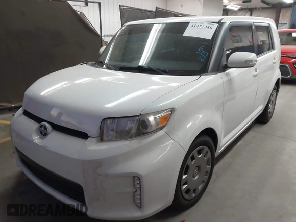 2014 Scion xB with VIN JTLZE4FE1EJ060281, listed as a IAAI auction lot 41477386 with 61,423 mi miles. Bid and sale history available at carsss.com. Image 17.