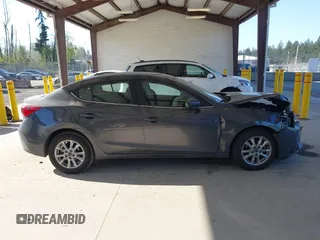 2014 Mazda 3 i Grand Touring with VIN JM1BM1W76E1174860, listed as a IAAI auction lot 42095053 with 44,727 mi miles and . Bid and sale history available at DreamBid. Image 14.