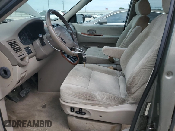 2004 Kia Sedona LX with VIN KNDUP131346575851, listed as a Copart auction lot 73614194 with 153,928 mi miles and Salvage Title. Bid and sale history available at carsss.com. Image 7.