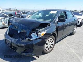 2009 Toyota Corolla with VIN JTDBL40E199094885, listed as a IAAI auction lot 41840789 with 106,498 mi miles. Bid and sale history available at carsss.com. Image 2.