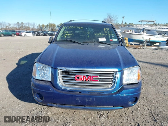 2006 GMC Envoy SLT with VIN 1GKDT13S762170322, listed as a IAAI auction lot 41324540 with 999,999 mi miles. Bid and sale history available at carsss.com. Image 11.