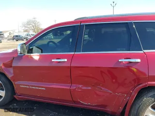 2014 Jeep Grand Cherokee Overland with VIN 1C4RJFCG2EC216406, listed as a IAAI auction lot 41944794 with 124,007 mi miles. Bid and sale history available at carsss.com. Image 14.