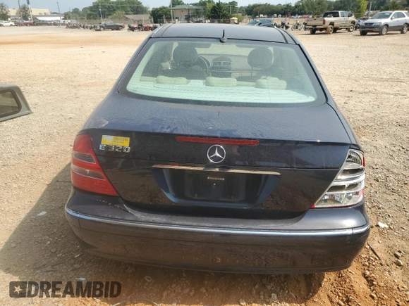 2003 Mercedes-Benz E-Class 3.2L with VIN WDBUF65JX3A313638, listed as a Copart auction lot 70869194 with 142,524 mi miles and Salvage Title. Bid and sale history available at carsss.com. Image 6.