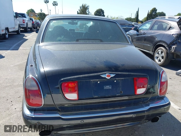 2001 Bentley Arnage with VIN SCBLC31E11CX06297, listed as a IAAI auction lot 41980275 with 63,510 mi miles and . Bid and sale history available at DreamBid. Image 16.