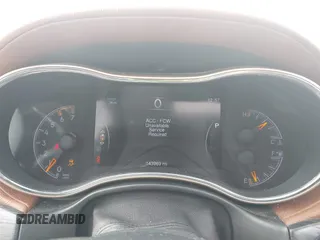2015 Jeep Grand Cherokee Summit z VIN 1C4RJFJT0FC674494, wystawiony jako IAAI lot #42056835 z przebiegiem 143 969 mil mil oraz . Historia ofert i sprzedaży dostępna na DreamBid. Obrazek 7.