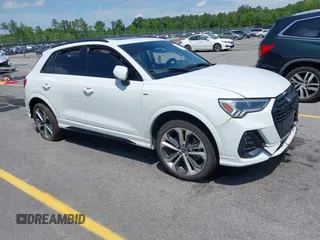 2021 Audi Q3 S line Premium Plus z VIN WA1EECF33M1024605, wystawiony jako IAAI lot #42062366 z przebiegiem 94 641 mil mil oraz . Historia ofert i sprzedaży dostępna na DreamBid. Obrazek 1.