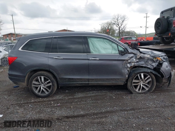 2016 Honda Pilot Touring with VIN 5FNYF6H93GB003106, listed as a IAAI auction lot 41989772 with 110,123 mi miles. Bid and sale history available at carsss.com. Image 13.
