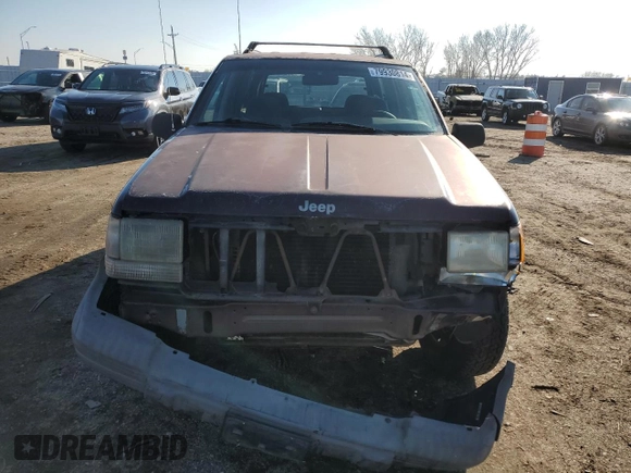 1997 Jeep Grand Cherokee Laredo with VIN 1J4GZ58S9VC687969, listed as a Copart auction lot 79930814 with 0 mi miles and Salvage Title. Bid and sale history available at carsss.com. Image 5.