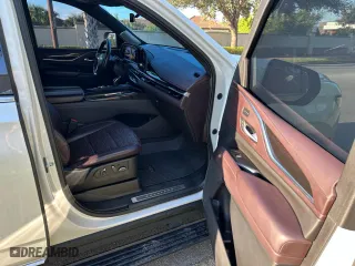 2022 Cadillac Escalade Premium Luxury Platinum with VIN 1GYS4DKL2NR201150, listed as a Copart auction lot 77114414 with 24,719 mi miles and Clean Title. Bid and sale history available at carsss.com. Image 5.
