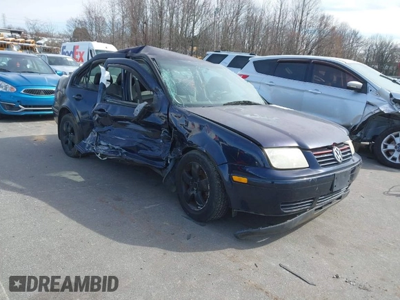 2000 Volkswagen Jetta GL z VIN 3VWRA29M2YM113489, wystawiony jako IAAI lot #41611184 z przebiegiem 210 865 mil mil oraz . Historia ofert i sprzedaży dostępna na DreamBid. Obrazek 1.
