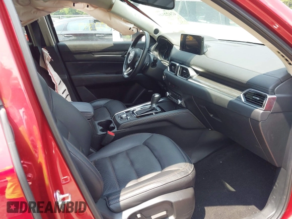 2021 Mazda CX-5 Grand Touring with VIN JM3KFBDM3M0434569, listed as a IAAI auction lot 42422349 with 25,924 mi miles and . Bid and sale history available at DreamBid. Image 5.