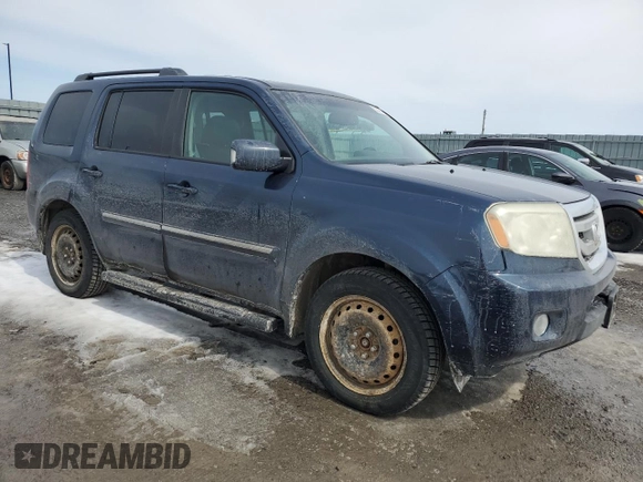 2010 Honda Pilot Touring with VIN 5FNYF4H99AB501127, listed as a Copart auction lot 52602285 with 271,602 mi miles and Salvage Title. Bid and sale history available at carsss.com. Image 4.