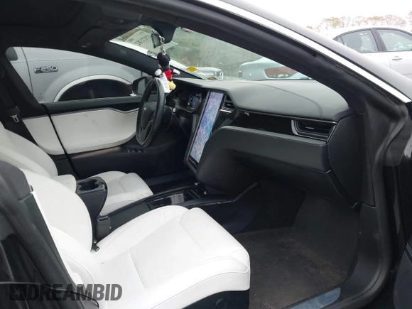 2018 Tesla Model S 75D with VIN 5YJSA1E24JF259874, listed as a IAAI auction lot 41921382 with 82,182 mi miles and . Bid and sale history available at DreamBid. Image 5.