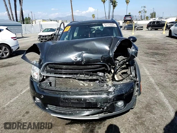 2016 MINI Countryman with VIN WMWZB3C58GWR47074, listed as a Copart auction lot 57174885 with 83,062 mi miles and Salvage title. Bid and sale history available at DreamBid. Image 13.