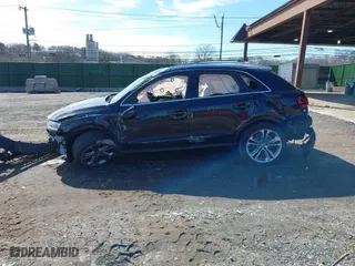 2015 Audi Q3 2.0T Premium Plus with VIN WA1EFCFS4FR001441, listed as a IAAI auction lot 41813239 with 112,795 mi miles. Bid and sale history available at carsss.com. Image 14.