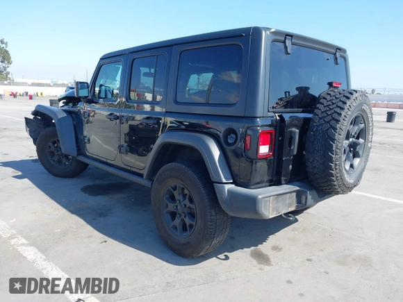 2020 Jeep Wrangler Unlimited Freedom with VIN 1C4HJXDG0LW238819, listed as a IAAI auction lot 42139357 with 67,619 mi miles and . Bid and sale history available at DreamBid. Image 3.