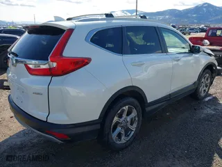 2019 Honda CR-V EX-L with VIN JHLRW2H81KX006771, listed as a IAAI auction lot 41670636 with 82,848 mi miles. Bid and sale history available at carsss.com. Image 4.