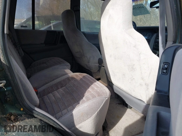 1993 Jeep Grand Cherokee Laredo with VIN 1J4GZ58S1PC680016, listed as a IAAI auction lot 41813392 with 149,520 mi miles. Bid and sale history available at carsss.com. Image 8.