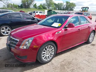 2011 Cadillac CTS with VIN 1G6DC5EY2B0143073, listed as a IAAI auction lot 42322497 with 133,992 mi miles and . Bid and sale history available at DreamBid. Image 2.